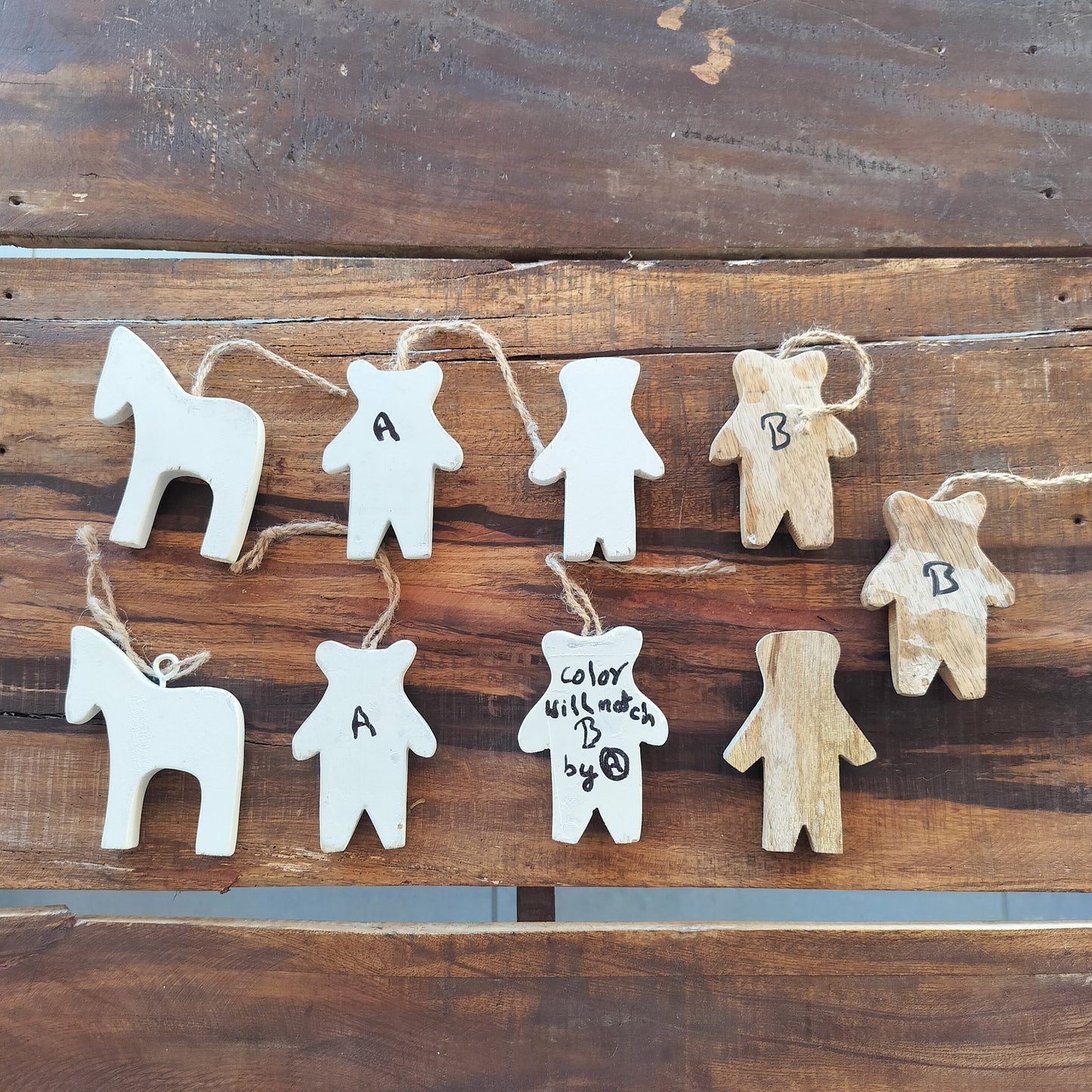 Secondhand - 9 træfigurer, bagsiden