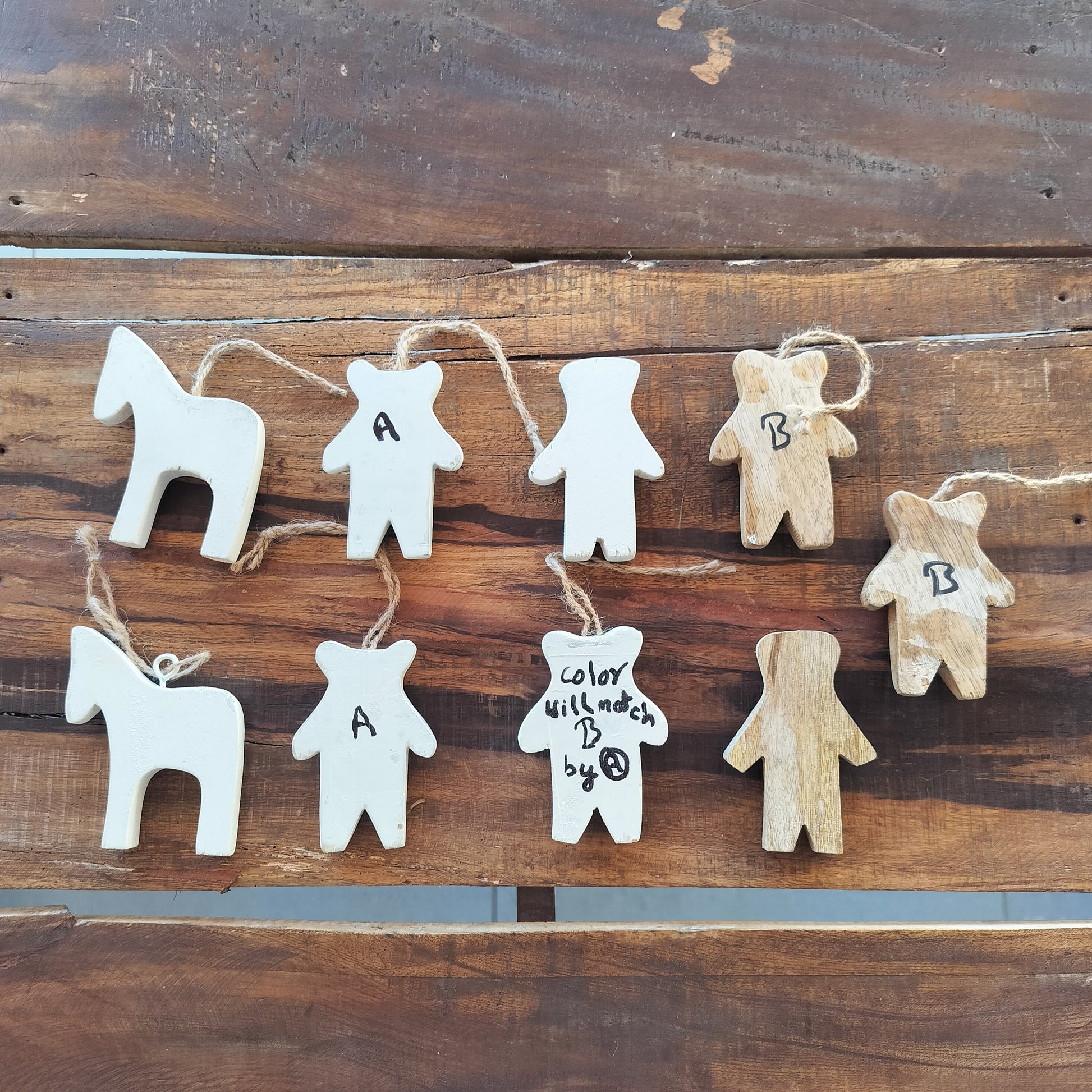 Secondhand - 9 træfigurer, bagsiden