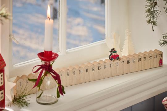 Ib Laursen julekalender med bil og gaver på taget