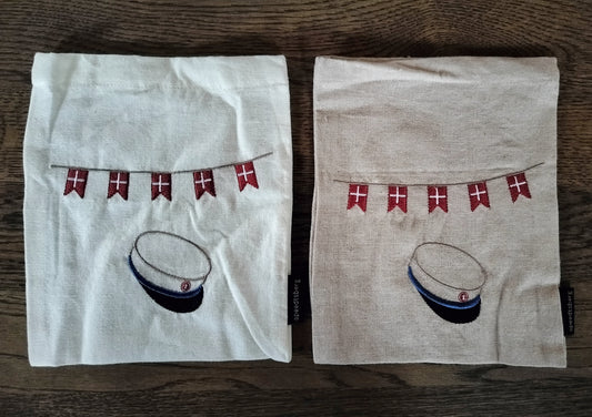 blå student gaveposer i natur og råhvid.