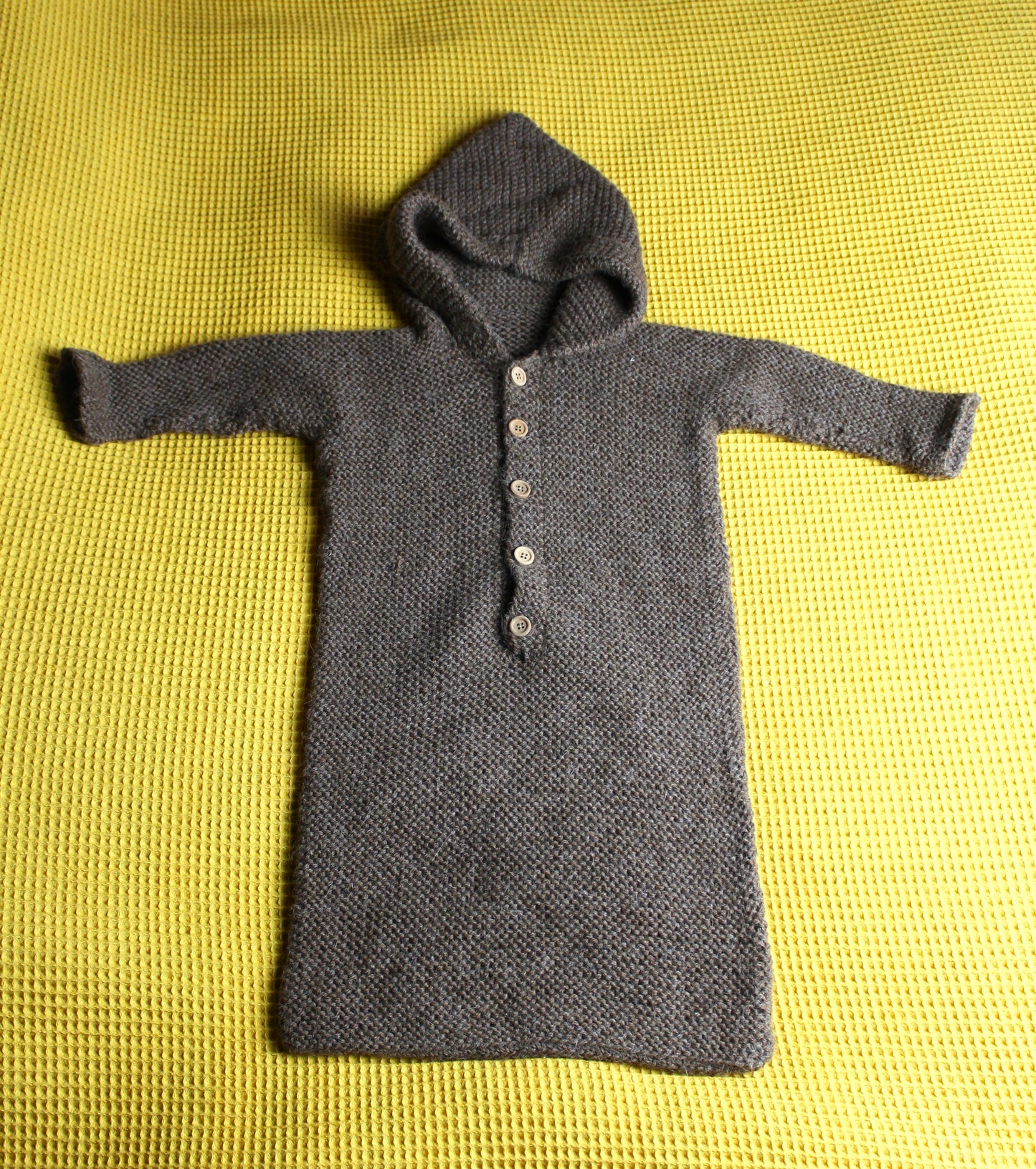 Håndstrikket kørepose til baby lavet af 100% alpaca uld (9-12 mdr)