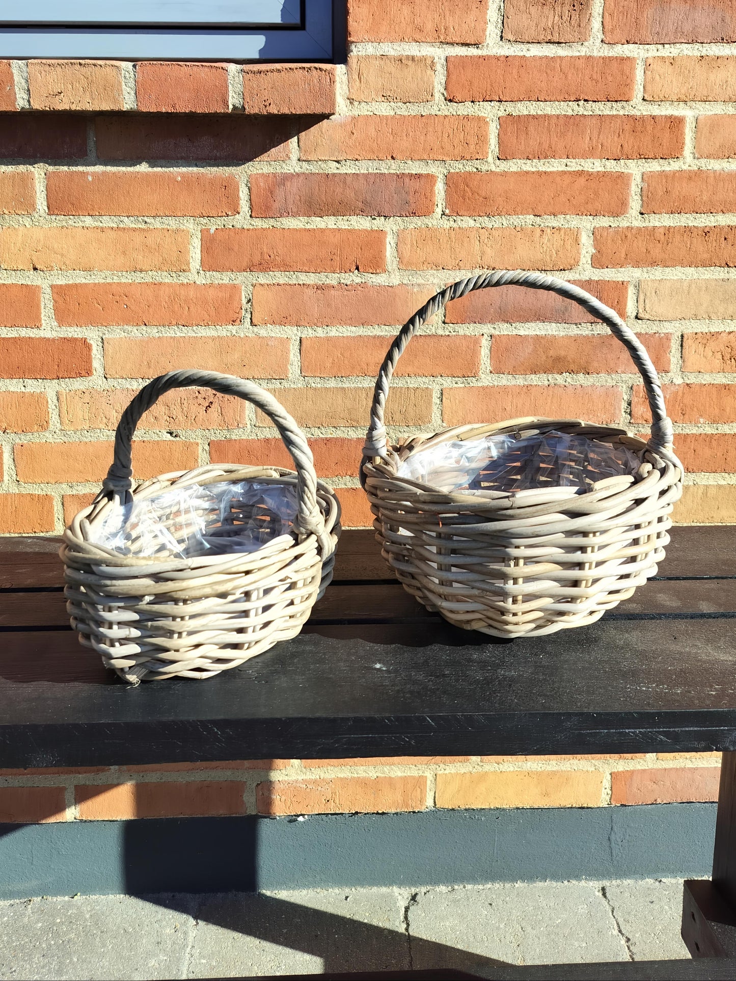 Mini bykurve ovalformet i flettet grå rattan
