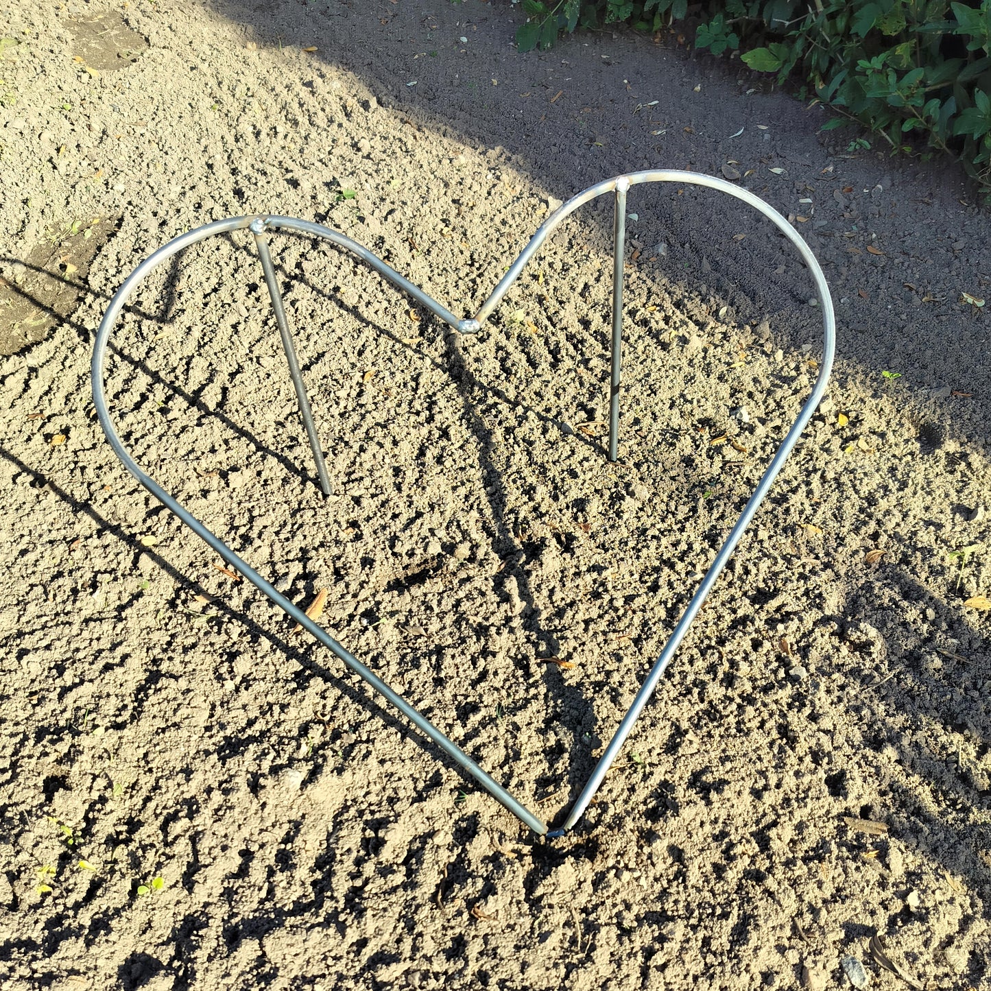 Metal hjerter på ben - large