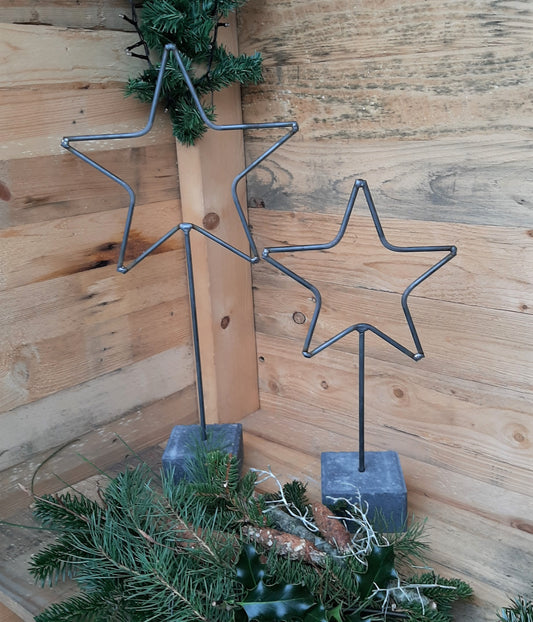 Metal stjerner på sten