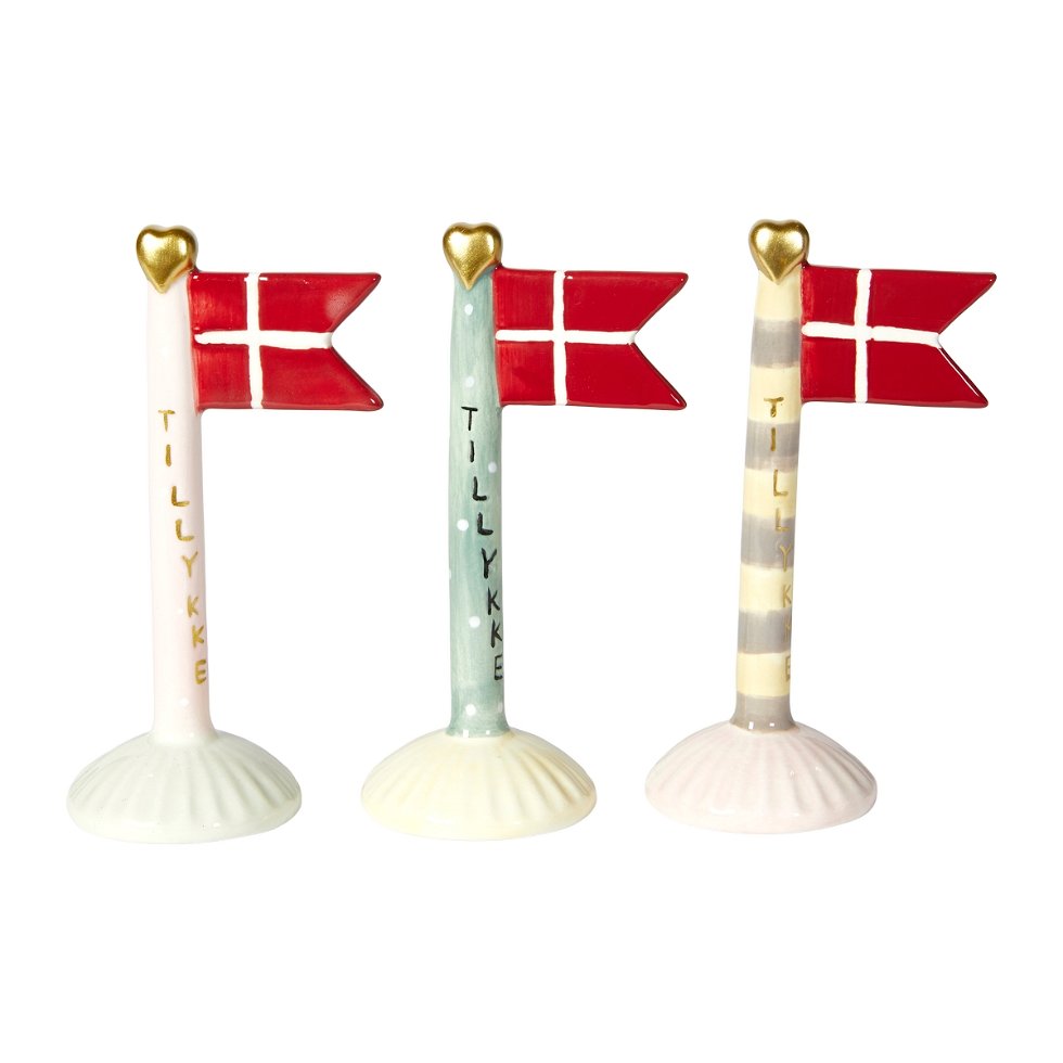 stribede eller prikkede keramik flag med tillykke tekst på.