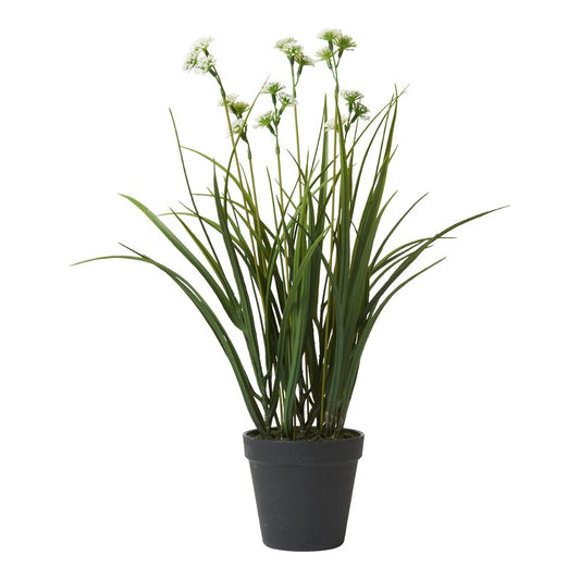 kunstig græs med blomster i potte