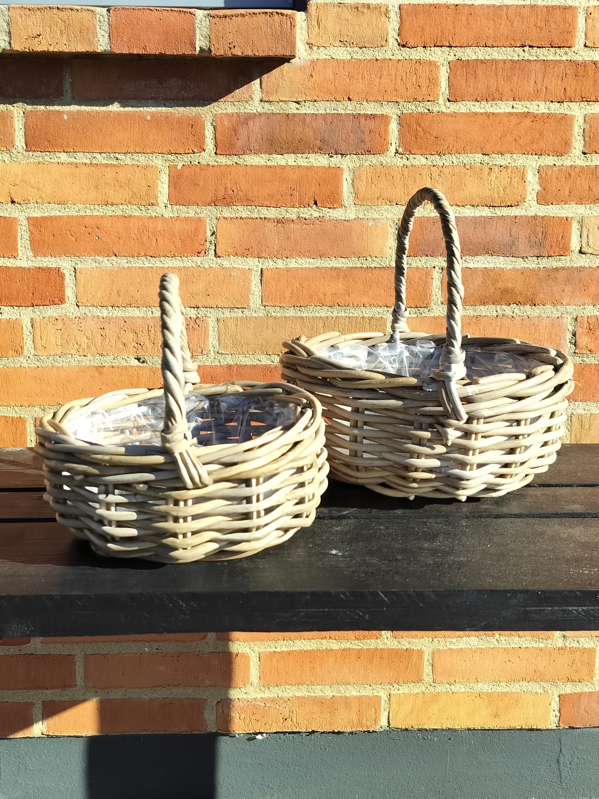 Mini bykurv ovalformet i flettet grå rattan